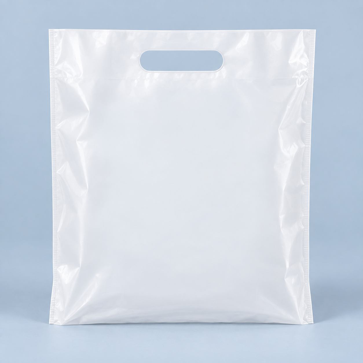 Rectangular plastic bag with a horizontal oval cut-out handle
